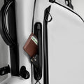 Player Preferred™ Golf Bag in Domino design, featuring a white exterior with ample storage pockets and a padded strap.