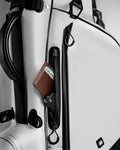 Player Preferred™ Golf Bag in Domino design, featuring a white exterior with ample storage pockets and a padded strap.
